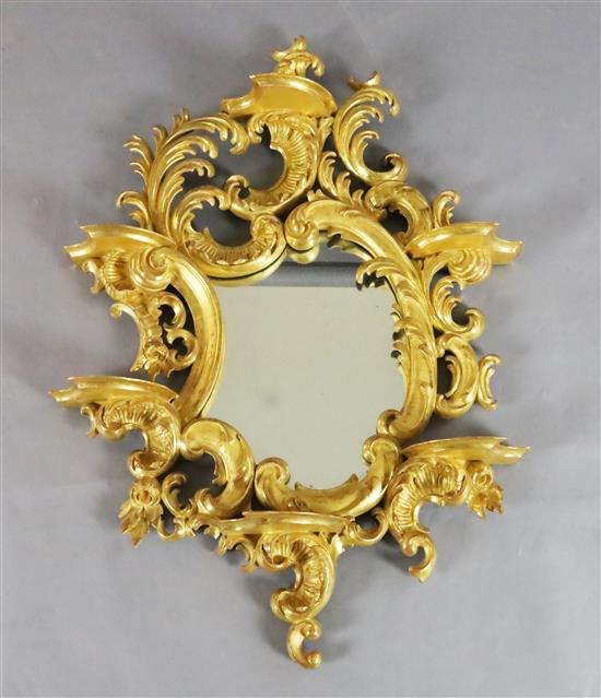 A 19th century Florentine giltwood wall mirror, W.2ft 2in. H.3ft